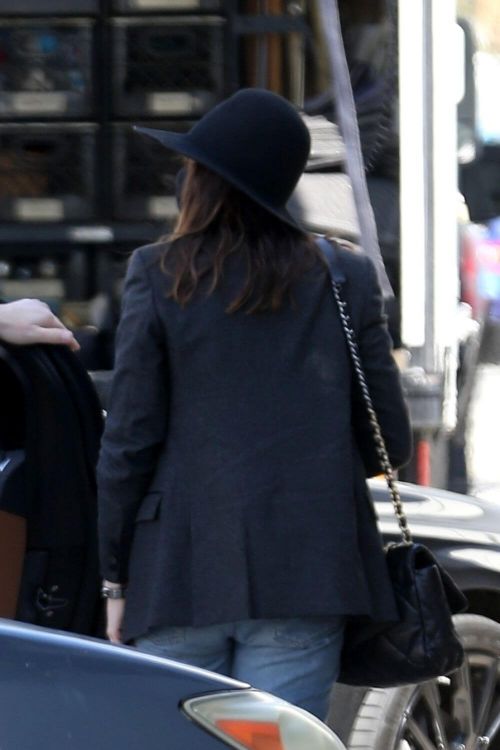 Anne Hathaway wears Black Blazer and Matching Fedora with Blue Denim as She Arrives at Milk Studios in Hollywood 03/12/2021 3