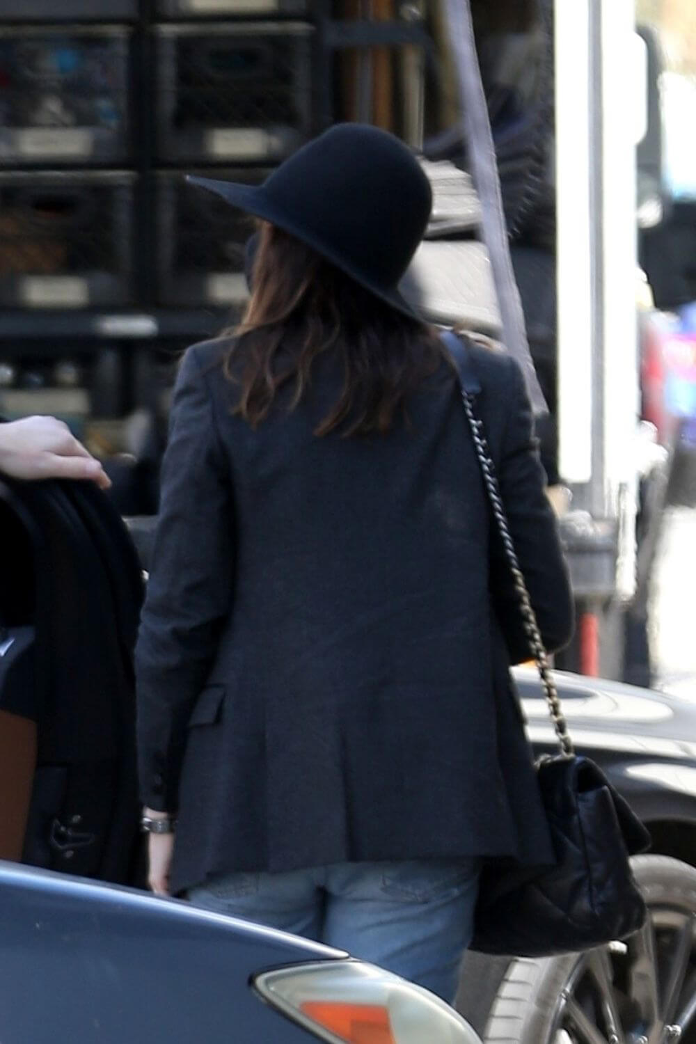 Anne Hathaway wears Black Blazer and Matching Fedora with Blue Denim as She Arrives at Milk Studios in Hollywood 03/12/2021 5