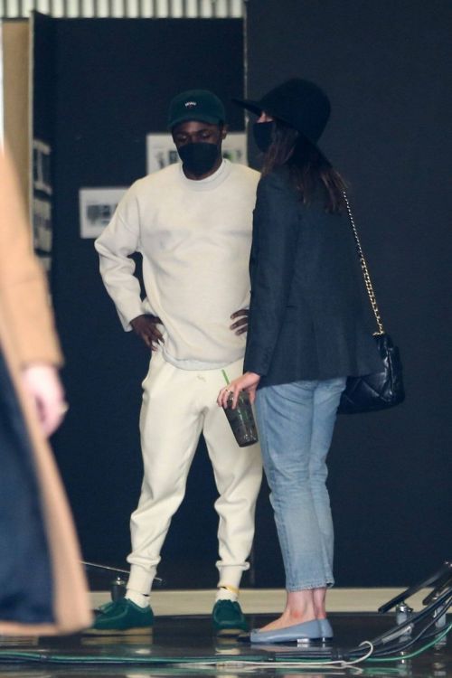 Anne Hathaway wears Black Blazer and Matching Fedora with Blue Denim as She Arrives at Milk Studios in Hollywood 03/12/2021 6