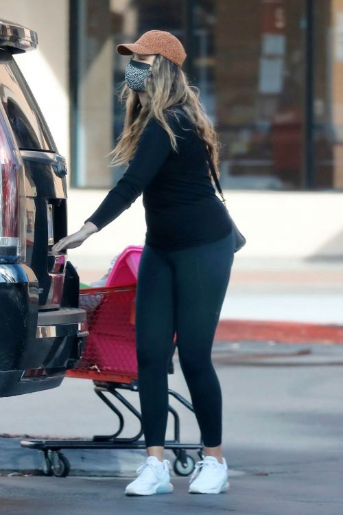 April Love Geary in Black Outfit Shopping at Michael