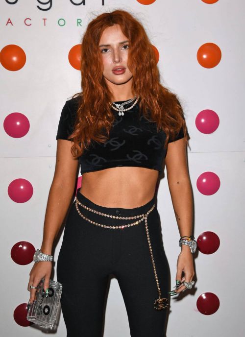 Bella Thorne Flashes Her Toned Midriff in Crop Top as She Hosts DJ Set and Listening Party at Sugar Factory in Miami 03/11/2021 9