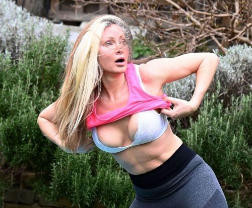 Caprice Bourret is Doing Yoga at a Park in London 03/23/2021