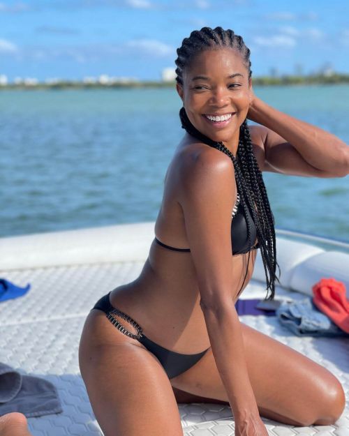 Gabrielle Union Enjoys in Bikinis at a Boat 03/12/2021 9
