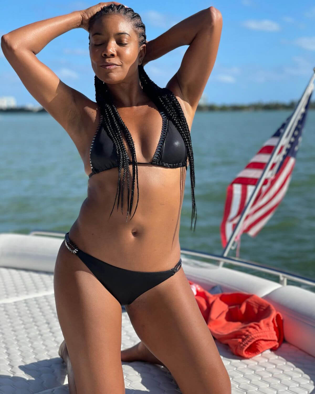 Gabrielle Union Enjoys in Bikinis at a Boat 03/12/2021 11