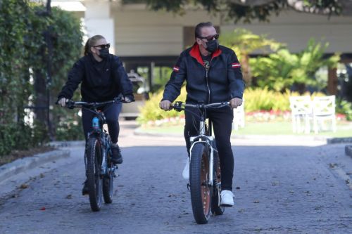 Heather Milligan and Arnold Schwarzenegger Day Out Riding Bikes in Santa Monica 03/13/2021 1