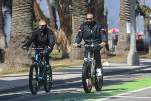 Heather Milligan and Arnold Schwarzenegger Day Out Riding Bikes in Santa Monica 03/13/2021 3
