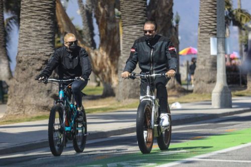 Heather Milligan and Arnold Schwarzenegger Day Out Riding Bikes in Santa Monica 03/13/2021 6