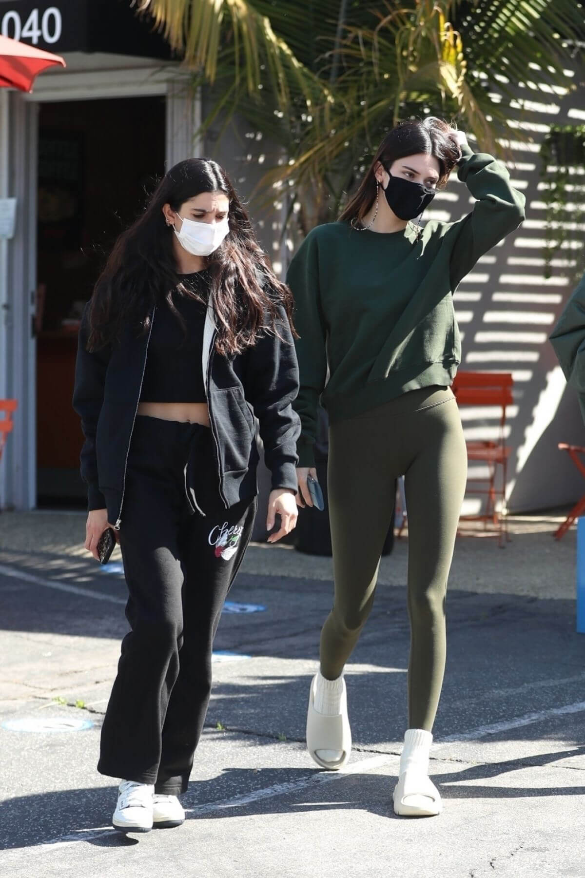 Kendall Jenner and Lauren Perez Steps Out for Coffee in West Hollywood 03/19/2021