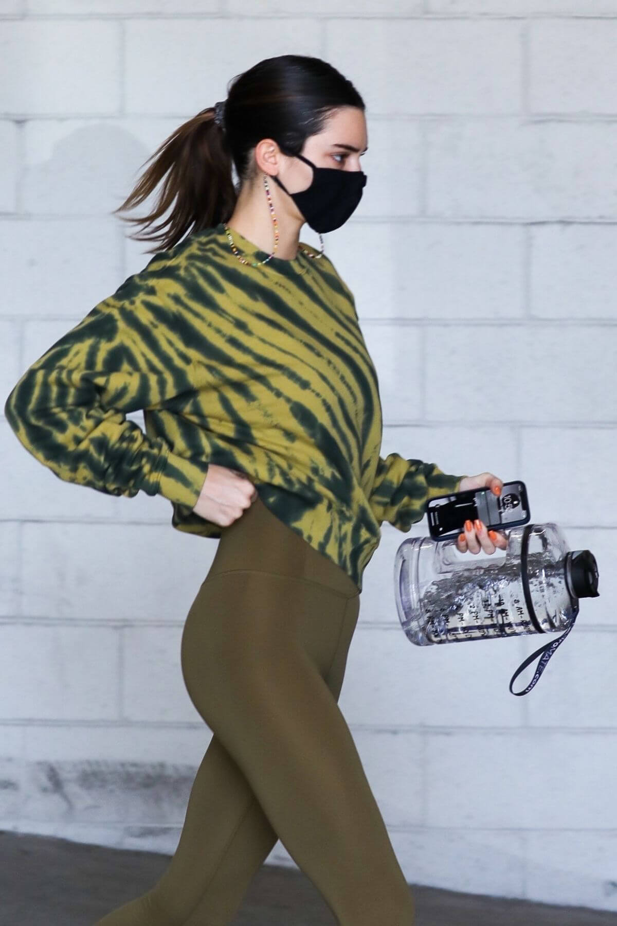 Kendall Jenner Display Her Figure in Olive Green Outfit as She Leaves a Gym in Beverly Hills 03/10/2021