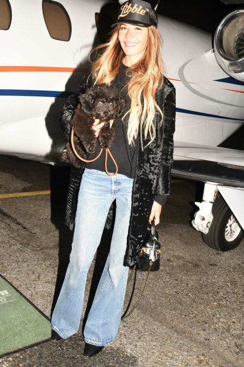 Libbie Mugrabi is Seen While Boarding a Private Jet to Miami 03/12/2021 6