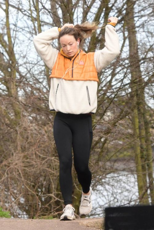 Olivia Wilde in Hoodie Jacket Out for Jogging in London 03/12/2021 2