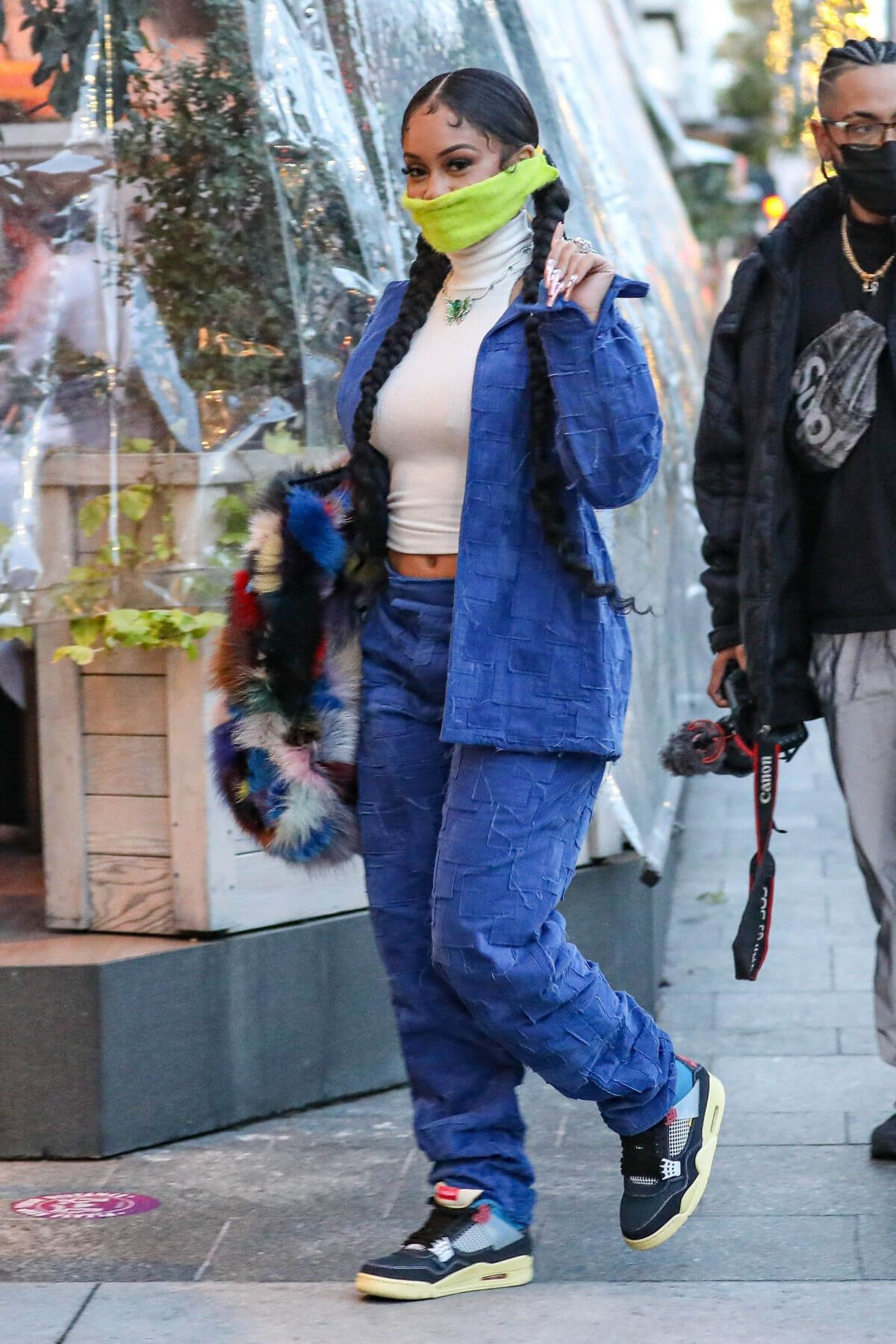 Saweetie done Double Denim as She is Out for Dinner at Avra in Beverly Hills 03/10/2021