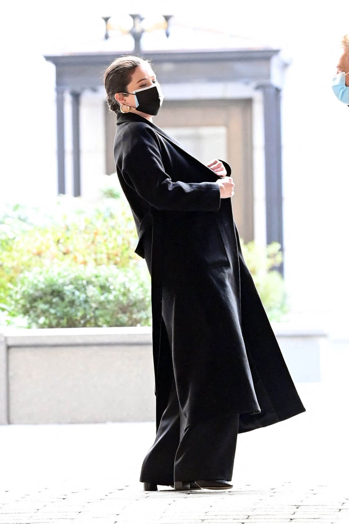 Selena Gomez in Black Oversized Coat filming 