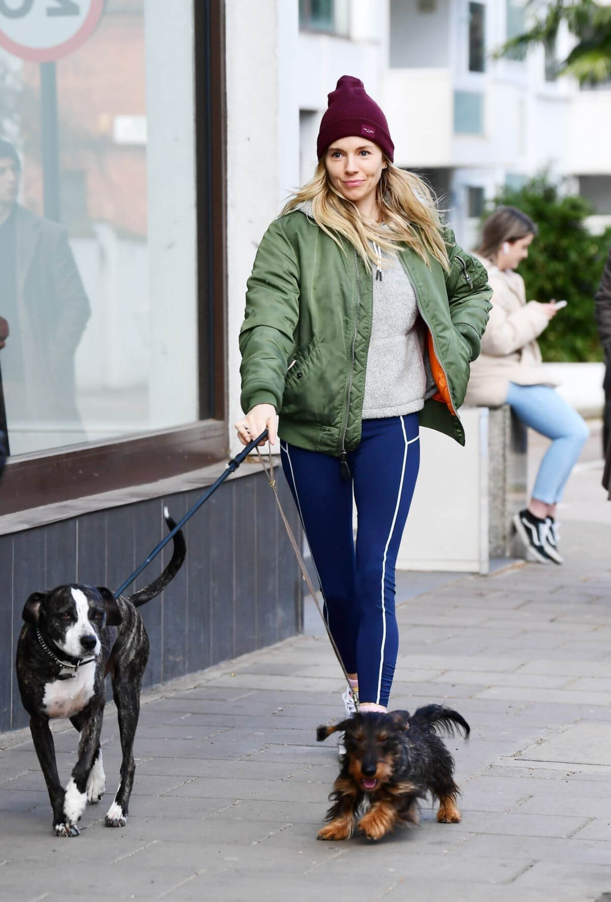 Sienna Miller Steps Out with Her Dogs in London 03/14/2021 6