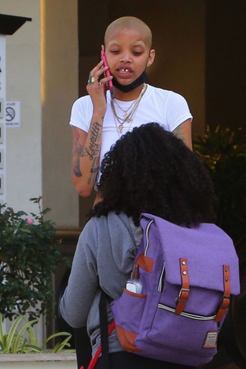 Slick Woods Steps Out with Friends in Los Angeles 03/19/2021 1