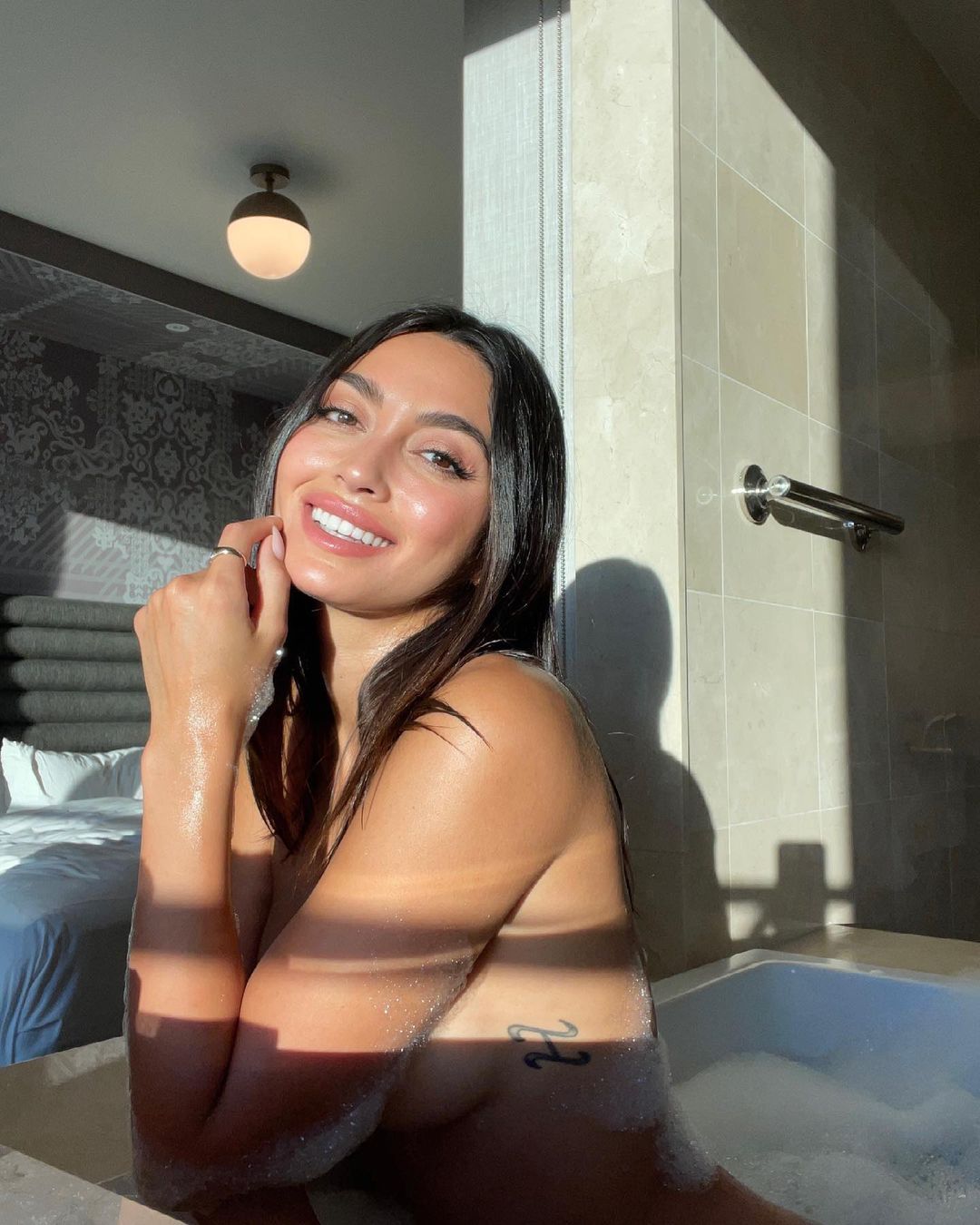 Ambra Battilana Gutierrez hot photoshoot in jacuzzi 06/14/2021