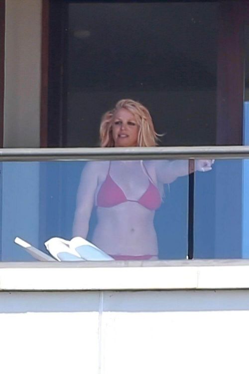 Britney Spears in Red Bikini with her boyfriend Sam Asghari at a Hotel Balcony in Hawaii 06/30/2021 5