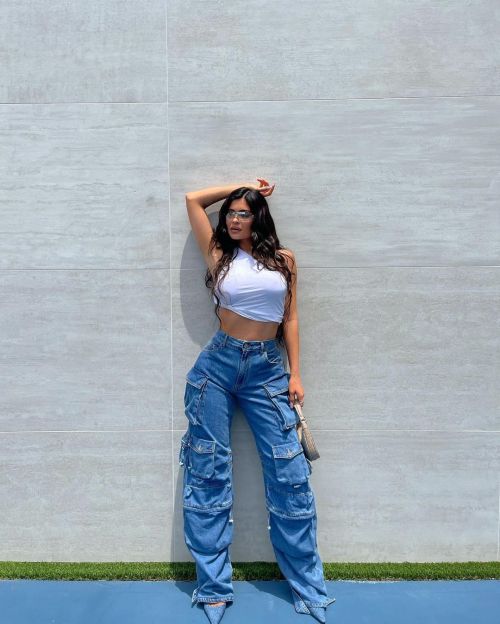 Kylie Jenner Photoshoot in White Crop Top and Multi-Pocket Jeans 06/30/2021 2