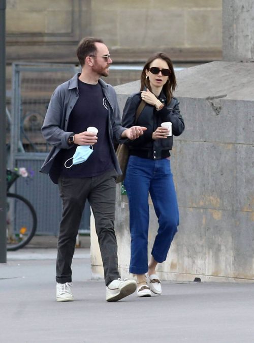 Lily Collins with her Partner Charlie McDowell Out in Paris 06/28/2021