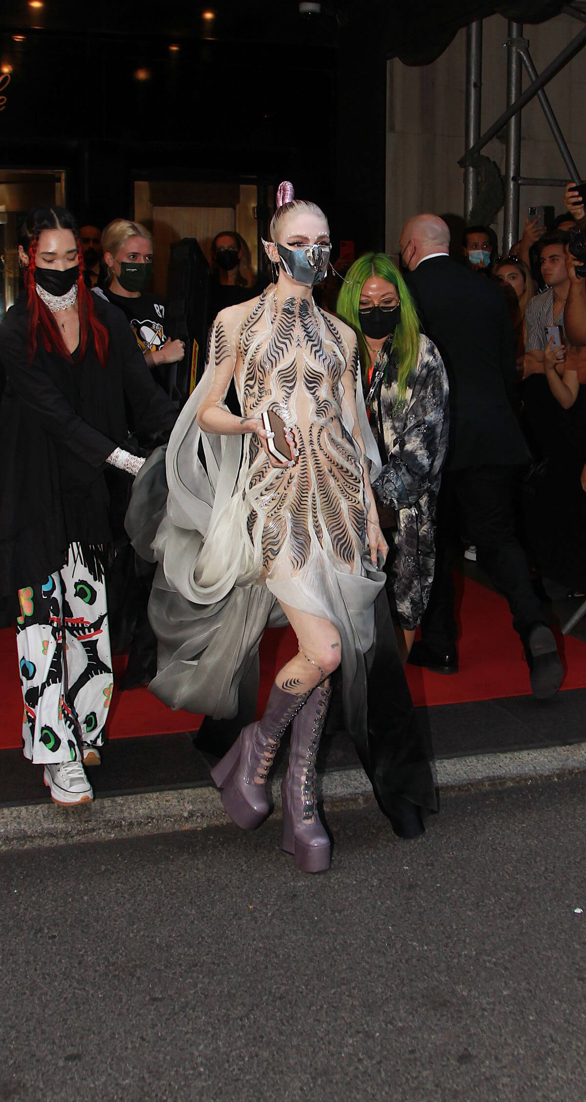 Grimes wears Metal Mask to 2021 Met Gala in New York 09/13/2021