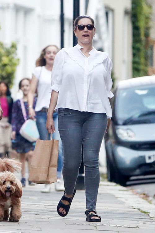 Kelly Brook Day Out in White Shirt and Denim in London 09/12/2021