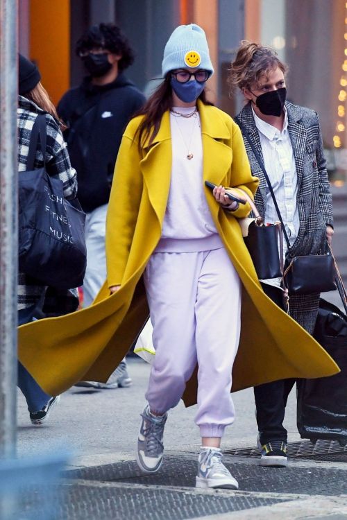 Anne Hathaway seen in Long Yellow Coat Out and About in New York 11/17/2021