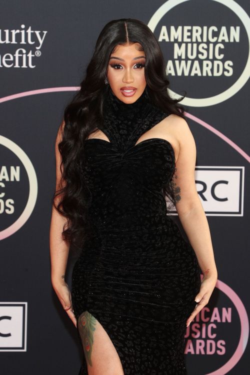 Cardi B seen in Black Dress attends 2021 American Music Awards in Los Angeles 11/19/2021 6