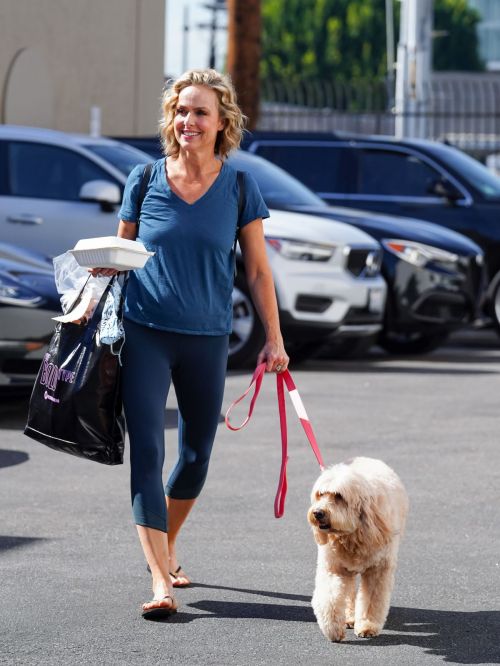 Melora Hardin walks with Her Dog in Los Angeles 10/29/2021