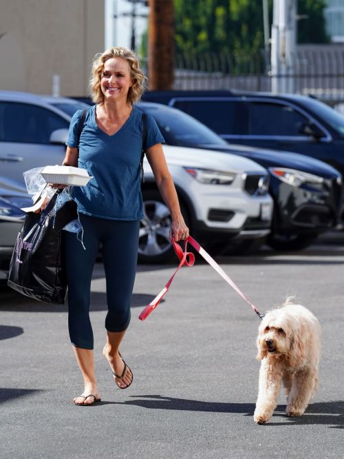 Melora Hardin walks with Her Dog in Los Angeles 10/29/2021