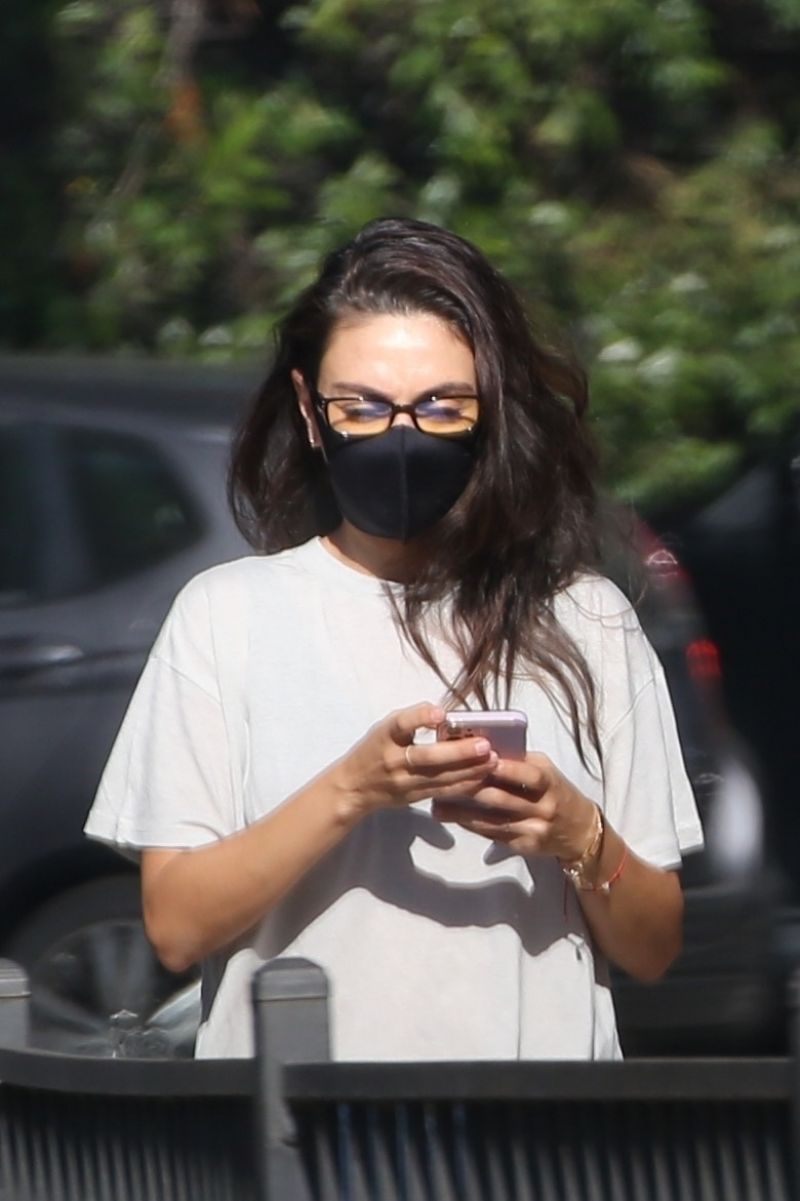 Mila Kunis in White Top and Ankle Denim Out and About in Beverly Hills 11/04/2021