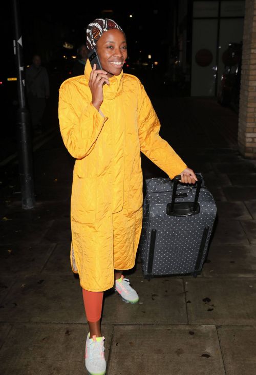 AJ Odudu seen in Yellow Long Coat Night Out in London 12/06/2021 3