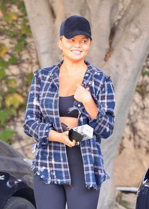Chrissy Teigen in Checked Shirt with Tights Day Out in Los Angeles