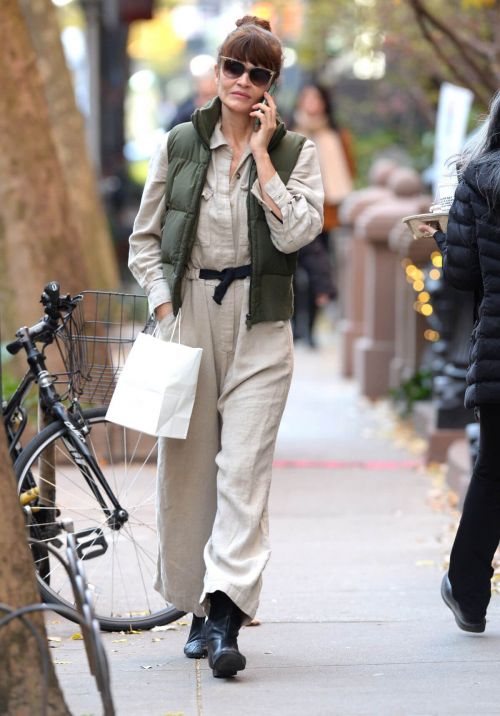 Helena Christensen in Jumpsuit with Puffer Jacket Out in New York
