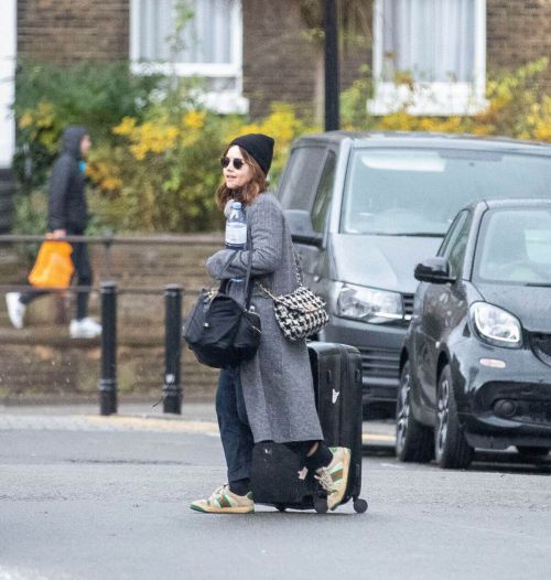 Jenna Coleman in Grey Coat with Watch Hat Out in London 3