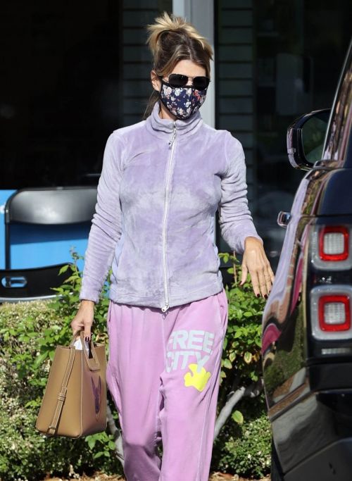 Lori Loughlin seen in FREE CITY Track Paints at a Gas Station in Los Angeles 11/19/2021 4