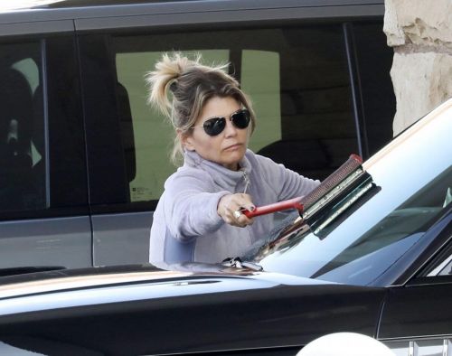Lori Loughlin seen in FREE CITY Track Paints at a Gas Station in Los Angeles 11/19/2021 8