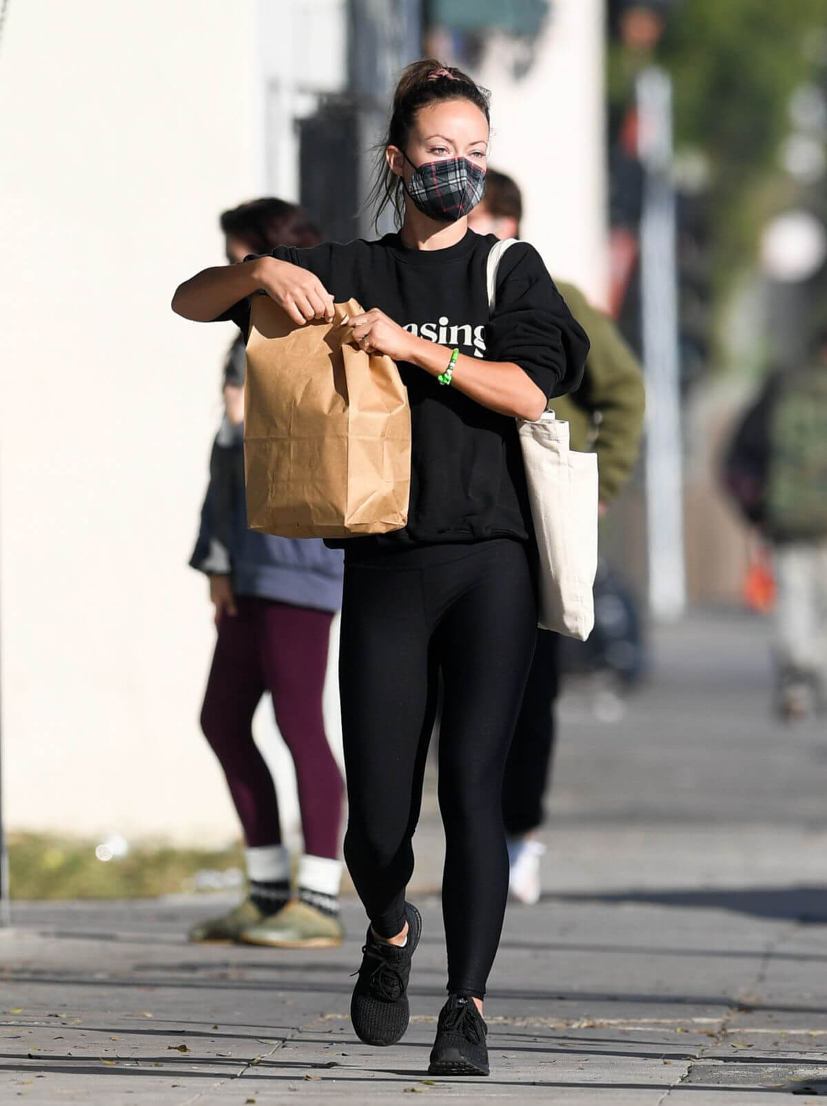 Olivia Wilde in a Black Sweatshirt with Tights Day Out in Los Angeles