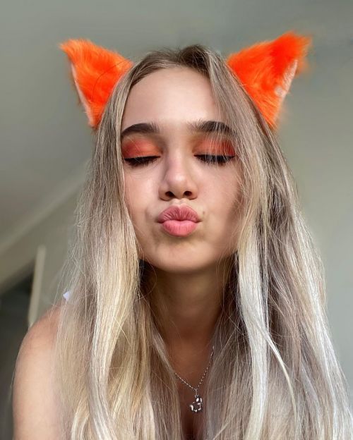 Alisa Goldfinch in White Tank Top with Fox Hairband - Instagram Photos, December 2021 1