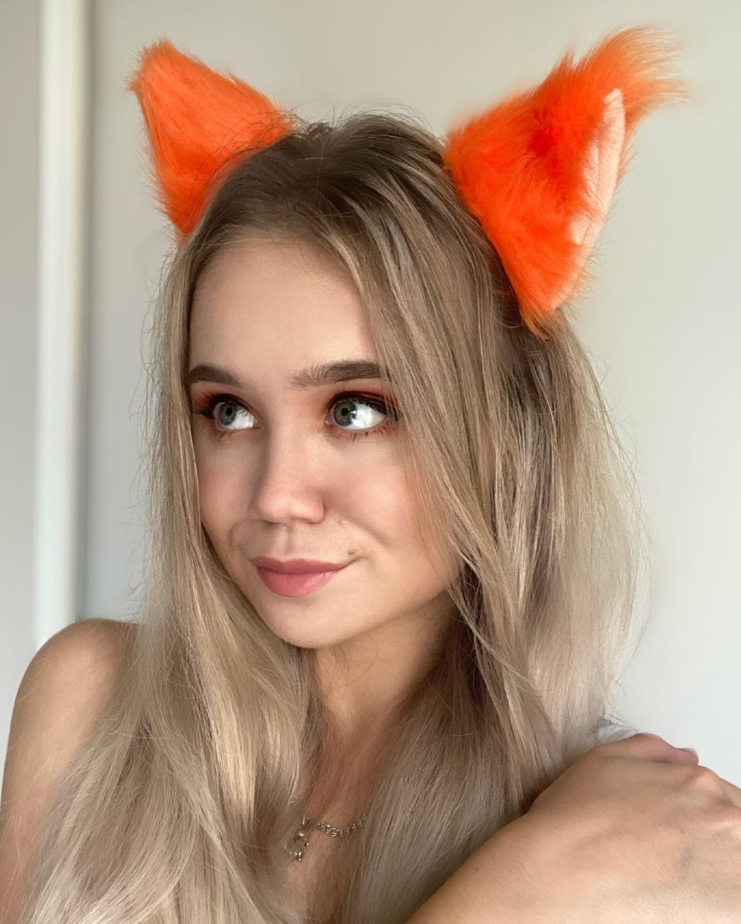 Alisa Goldfinch in White Tank Top with Fox Hairband - Instagram Photos, December 2021 2