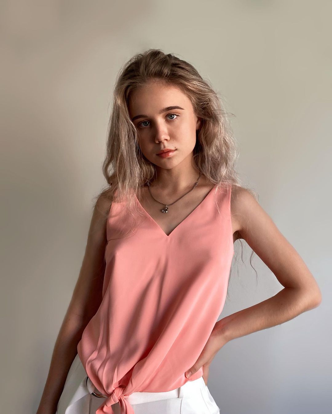 Alisa Goldfinch Photoshoot in Peach Color Top and White Bottom, January 2022 1