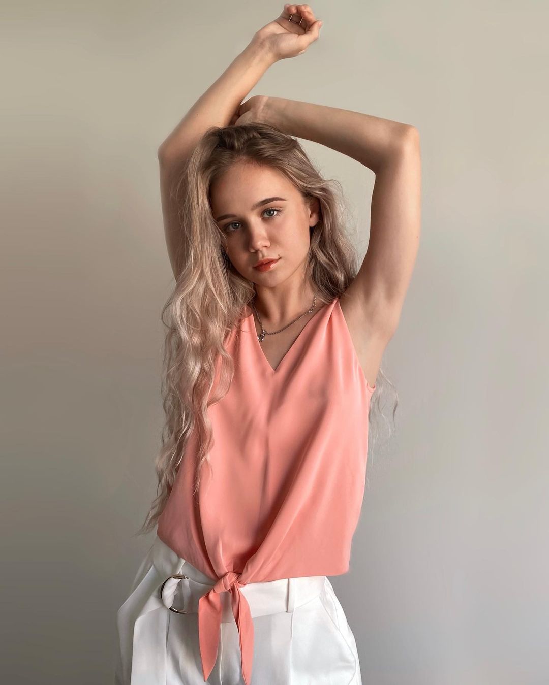 Alisa Goldfinch Photoshoot in Peach Color Top and White Bottom, January 2022