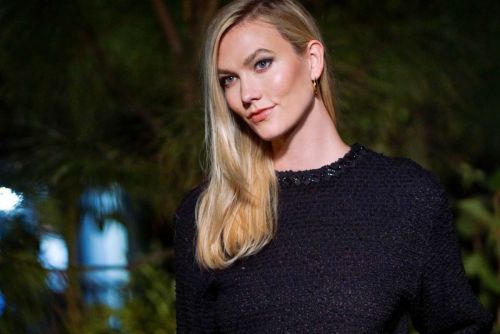 Karlie Kloss Night Out in Black Dress at Chanel Dinner to Celebrate Five Echoes in Miami