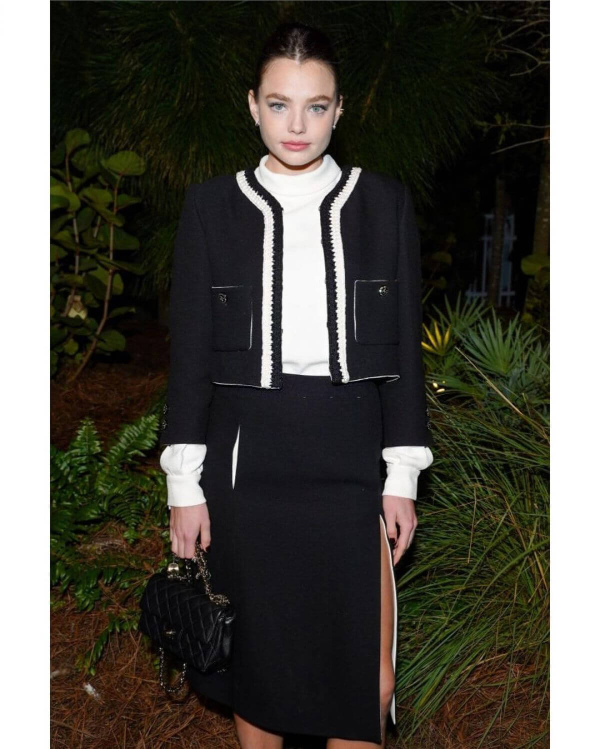 Kristine Froseth in Black and White Outfit at Chanel Dinner to Celebrate Five Echoes in Miami 2
