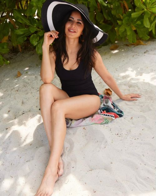 Katrina Kaif in Black Swimsuit with Sun Hat in Beach, April 2022