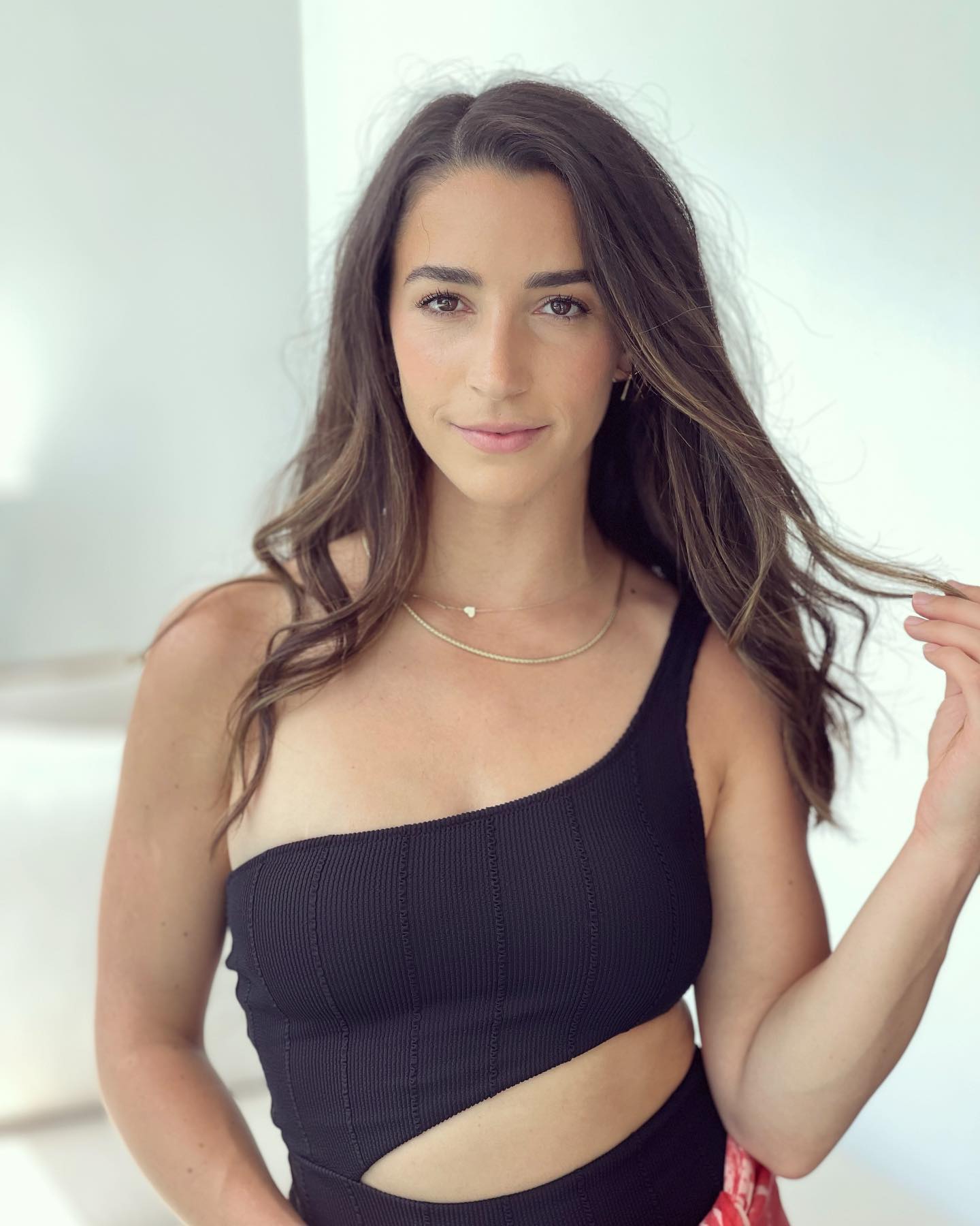 Aly Raisman in Black Aerie Off Shoulder Dress, March 2022