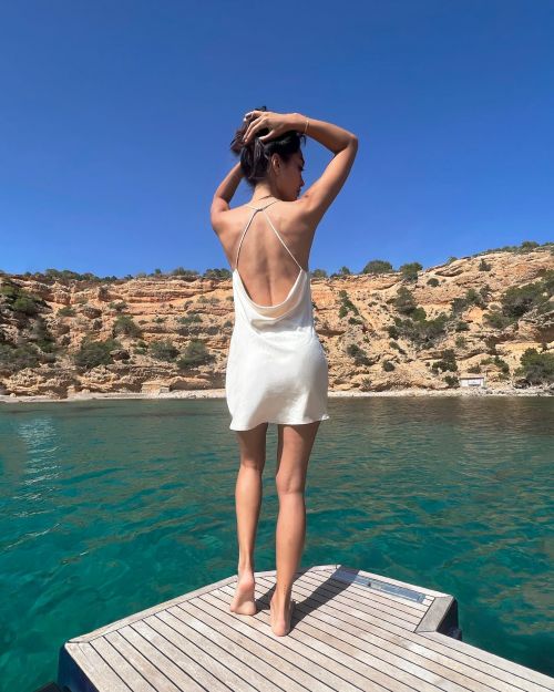 Ambra Gutierrez Shared her Pictures in Short White Dress on Social Media at Ibiza, Spain, May 2022 3