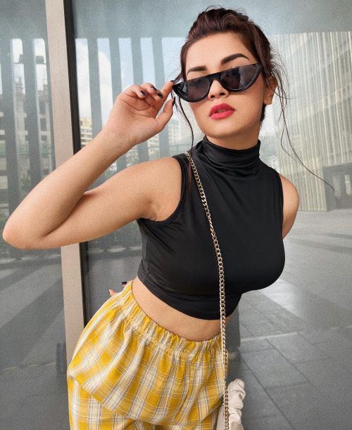 Avneet Kaur poses in Urbanic Black Top and Checked Bottom 3