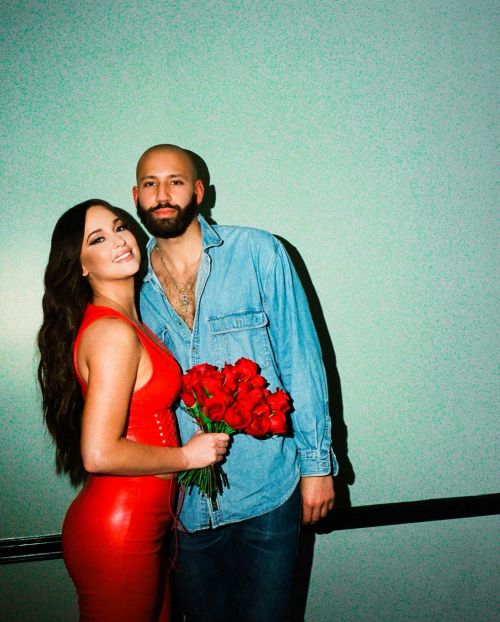 Kacey Musgraves Photoshoot in Red Attire with Holding Red Rose Bouquet, February 2022 3