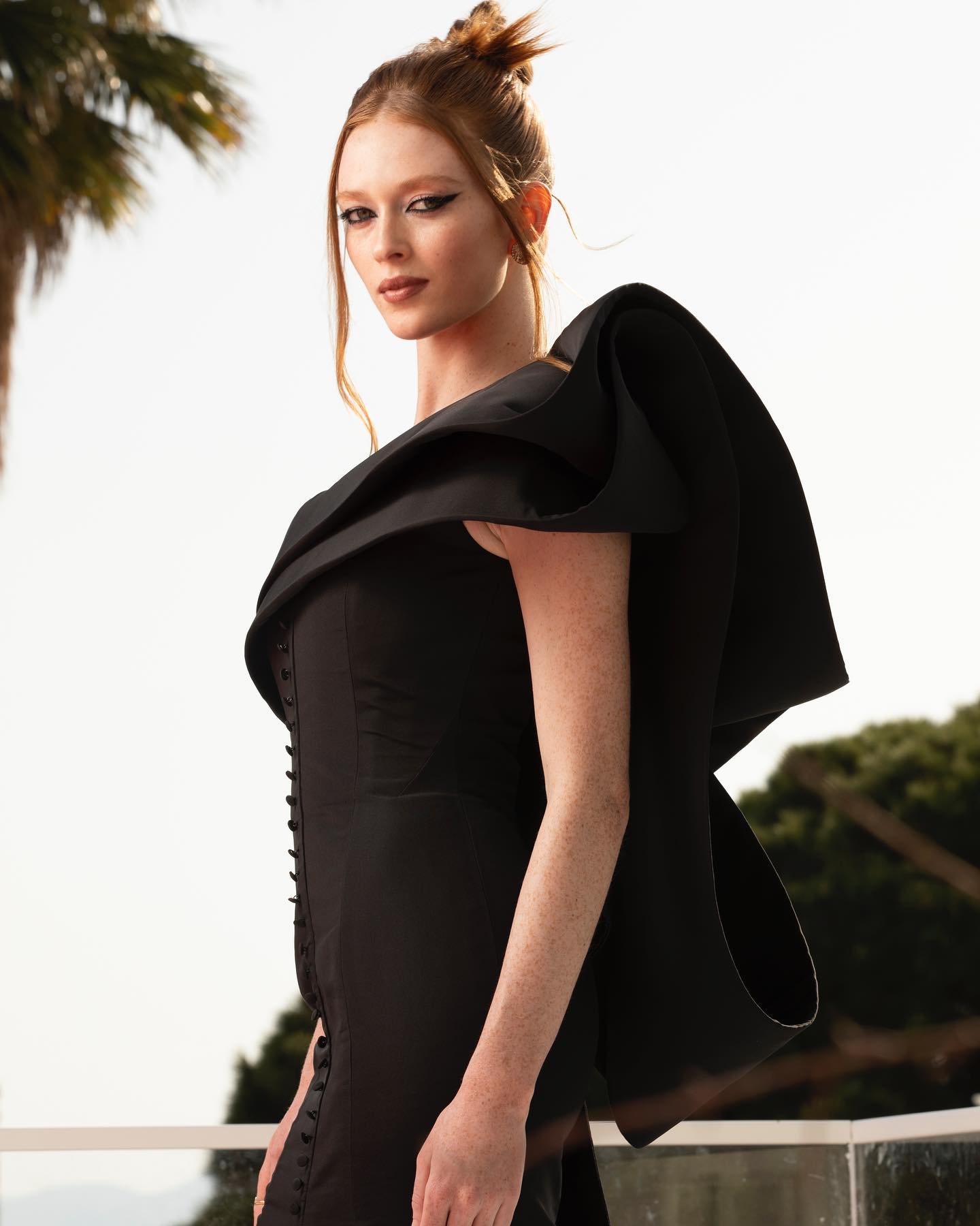 Larsen Thompson Photoshoot in Black Gown at 2022 Cannes Film Festival, May 2022
