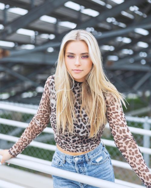 Morgan Raine wore a Animal Print Top and Denim in Photoshoot at Texas
